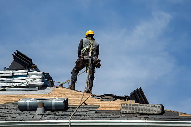 Professional Gutter Installation technician working in Clinton, MA